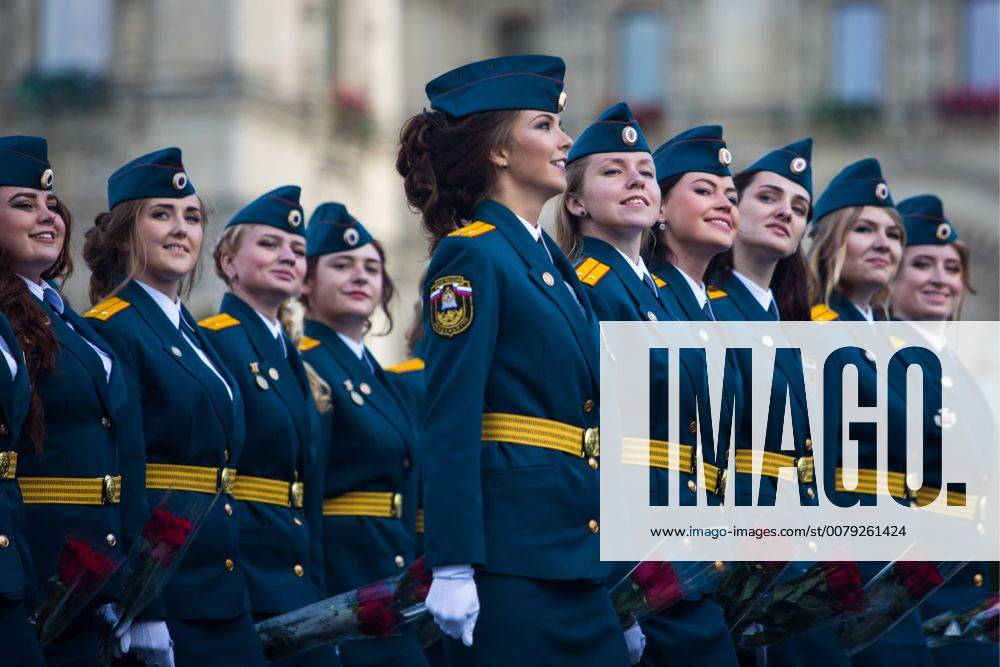 Russian Graduation MOSCOW, RUSSIA - : Graduates march in formation during a graduation ...