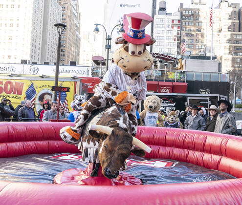 New York, NY - January 2, 2020: Staten Island Yankees mascot Scooter the  Holy Cow attends mechanical bull rides during Professional Bull Riders  launch of season 2020 outside of Madison Square Garden Stock Photo - Alamy