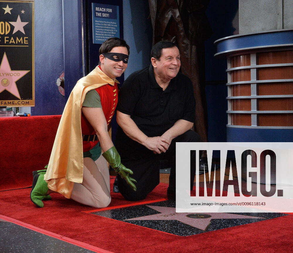 Actor Burt Ward, who played Robin on the Batman television series is joined  by a Robin