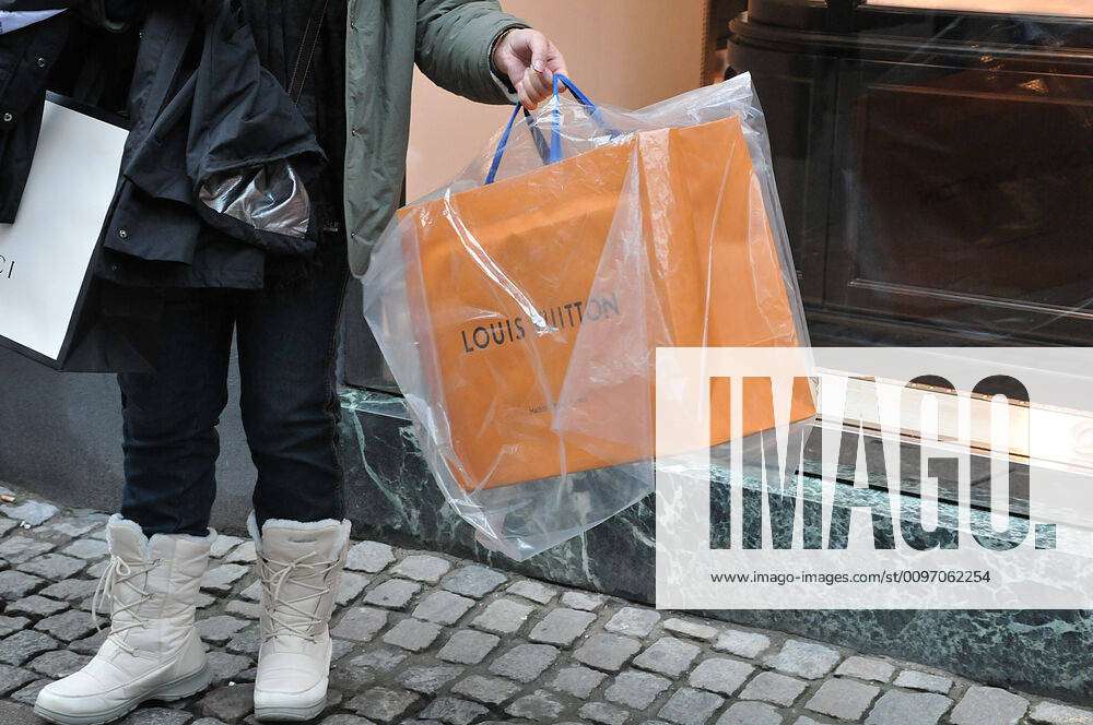 Consumers with Louis Vuitton Bags in Copenhagen Denmark Editorial