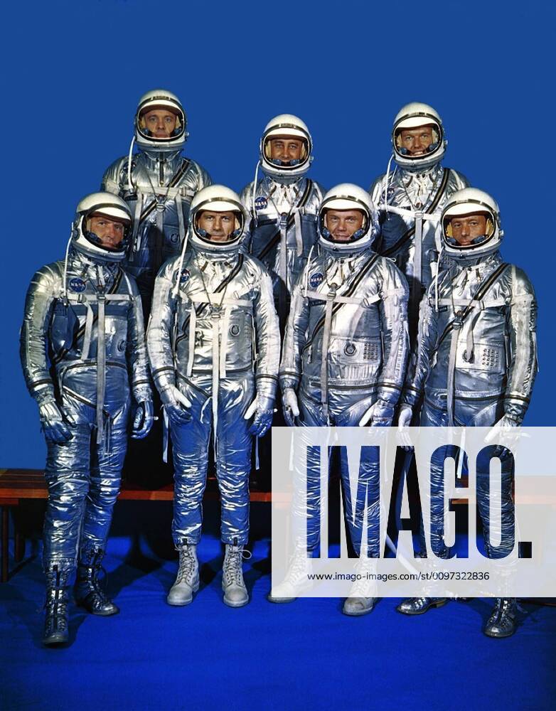 Project Mercury astronauts in their space suits. Front row left