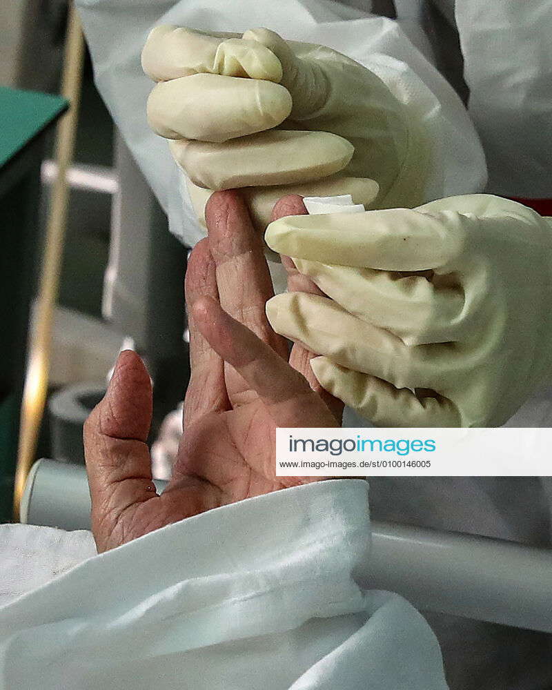 Moscow Testing MOSCOW, RUSSIA - : A nurse takes blood for testing at an intensive care ...