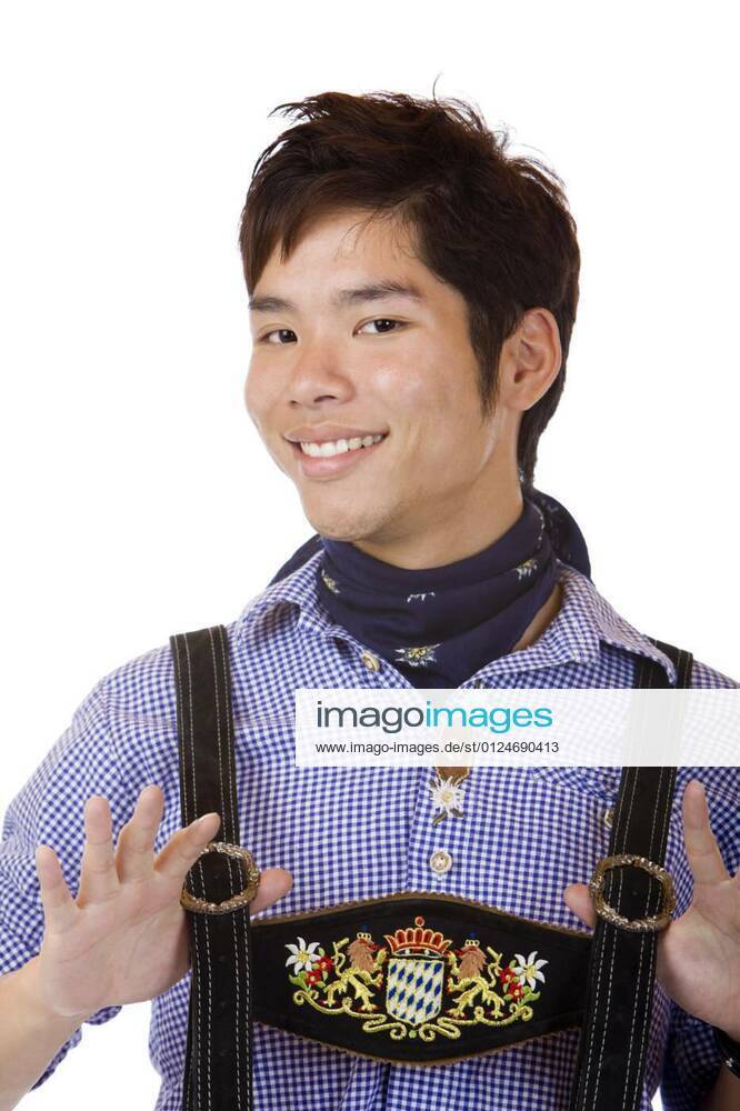 Attractive asians serving bavarian lederhosen model released, Symbolfoto