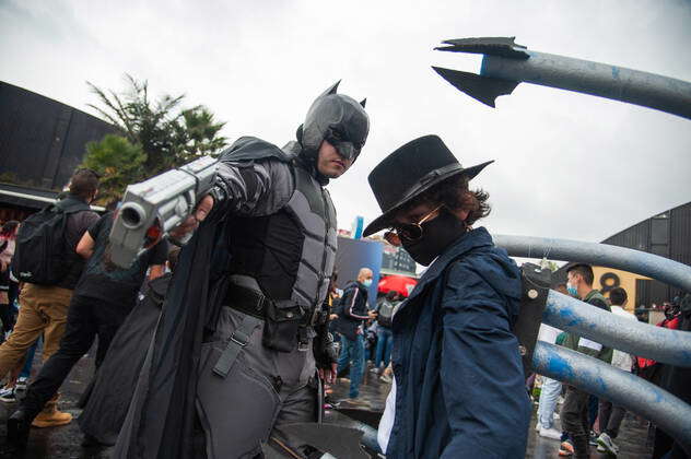 A father and his son cosplay DC character Batman (Left) and Marvel's  Spiderman enemy Doctor Octopus (Right) during the first day of the SOFA  (Salon del Ocio y la Fantasia) 2021, a