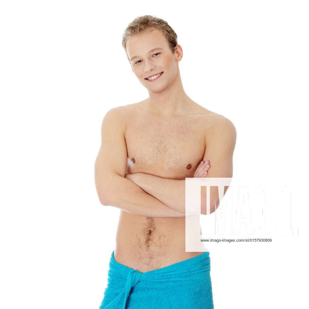 Handsome, young, naked man with the towel around his waist. Isolated on  white, model released