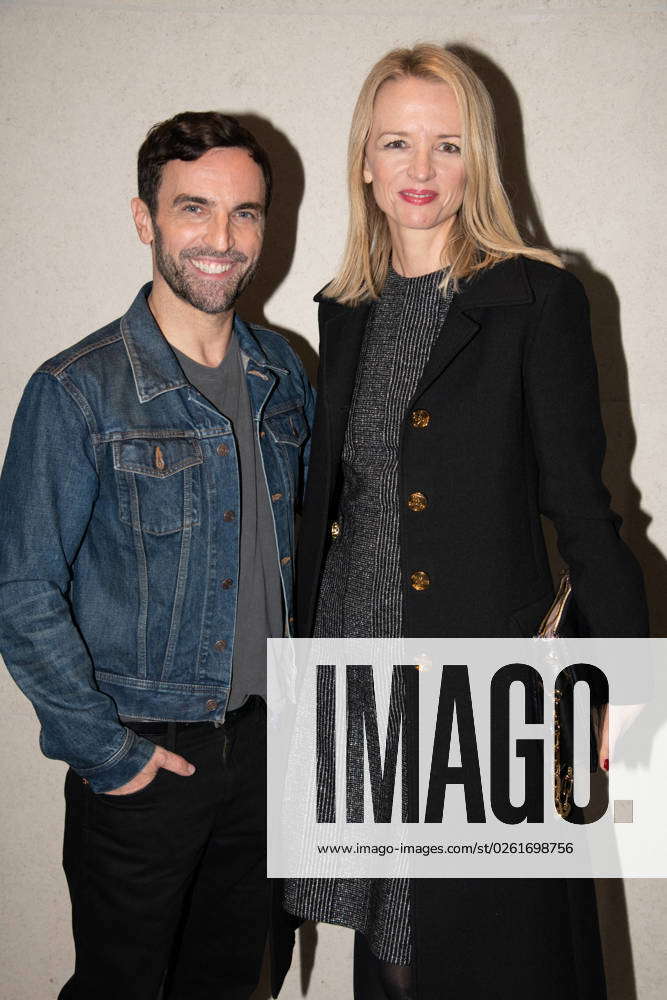 PFW - Louis Vuitton Cocktail Photocall Designer Nicolas Ghesquiere and Delphine  Arnault attend the