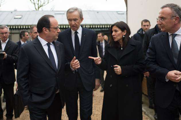French President Francois Hollande and LVMH Group CEO Bernard Arnault  attending the presentation of a major cultural project for the city of  Paris, at Jardin d'Acclimatation amusement park in Paris, France on