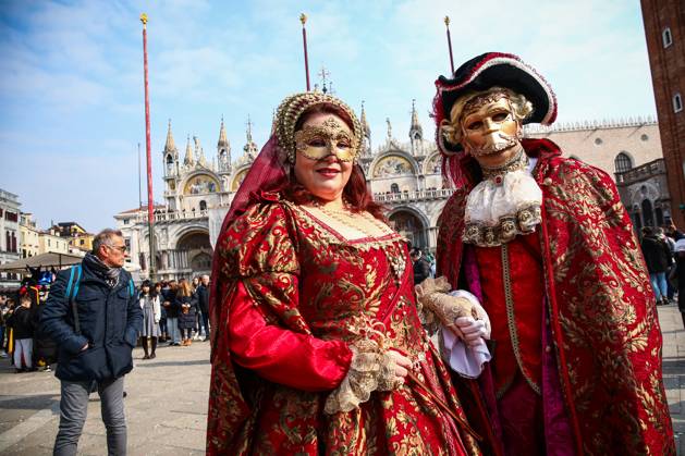 Venice Carnival Masked revellers take part in the Venice Carnival at St ...